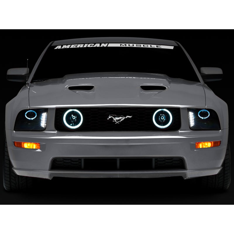 Raxiom 05-09 Ford Mustang w/ Halogen LED Halo Prjctr Headlights-Blk Hsng(Smoked Lens Exclude GT500)